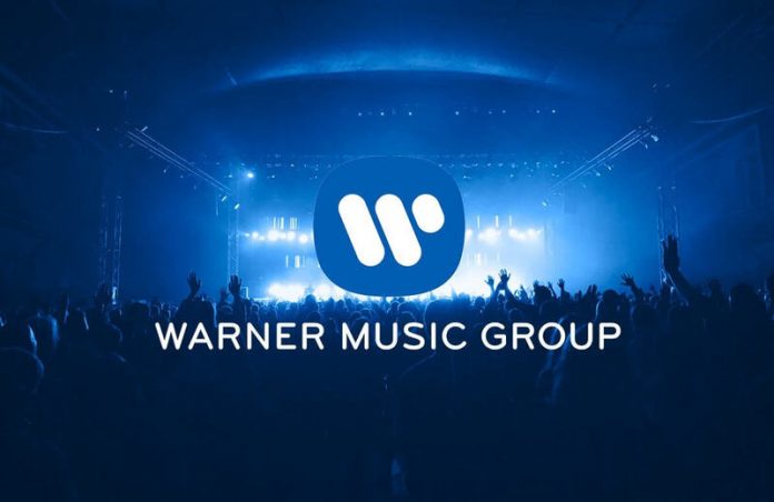 Warner Music Group se asocia con OpenSea para abrir la Web3 a sus artistas.